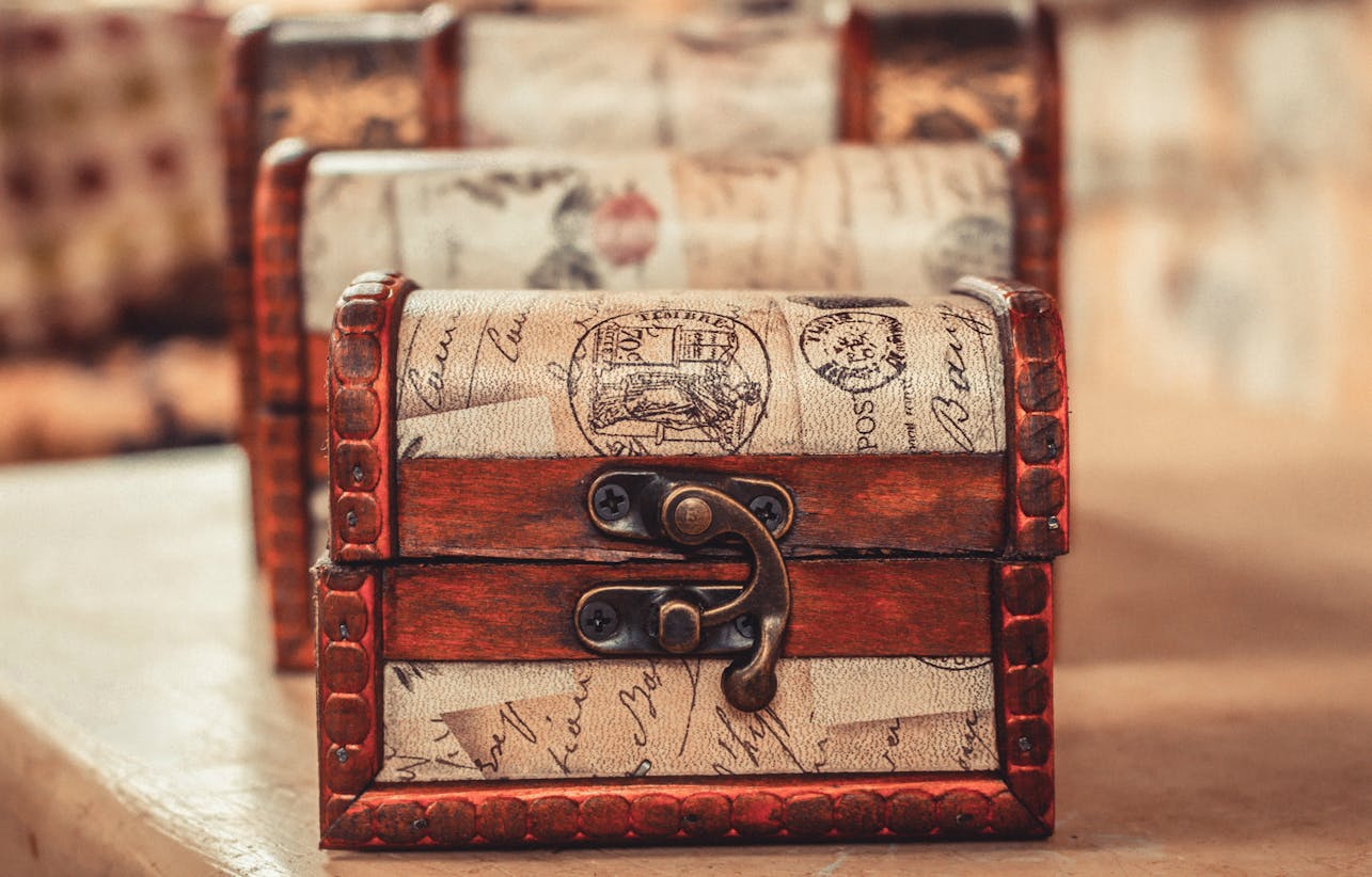 Close-up of an ornate wooden chest with vintage design elements, ideal for decoration.